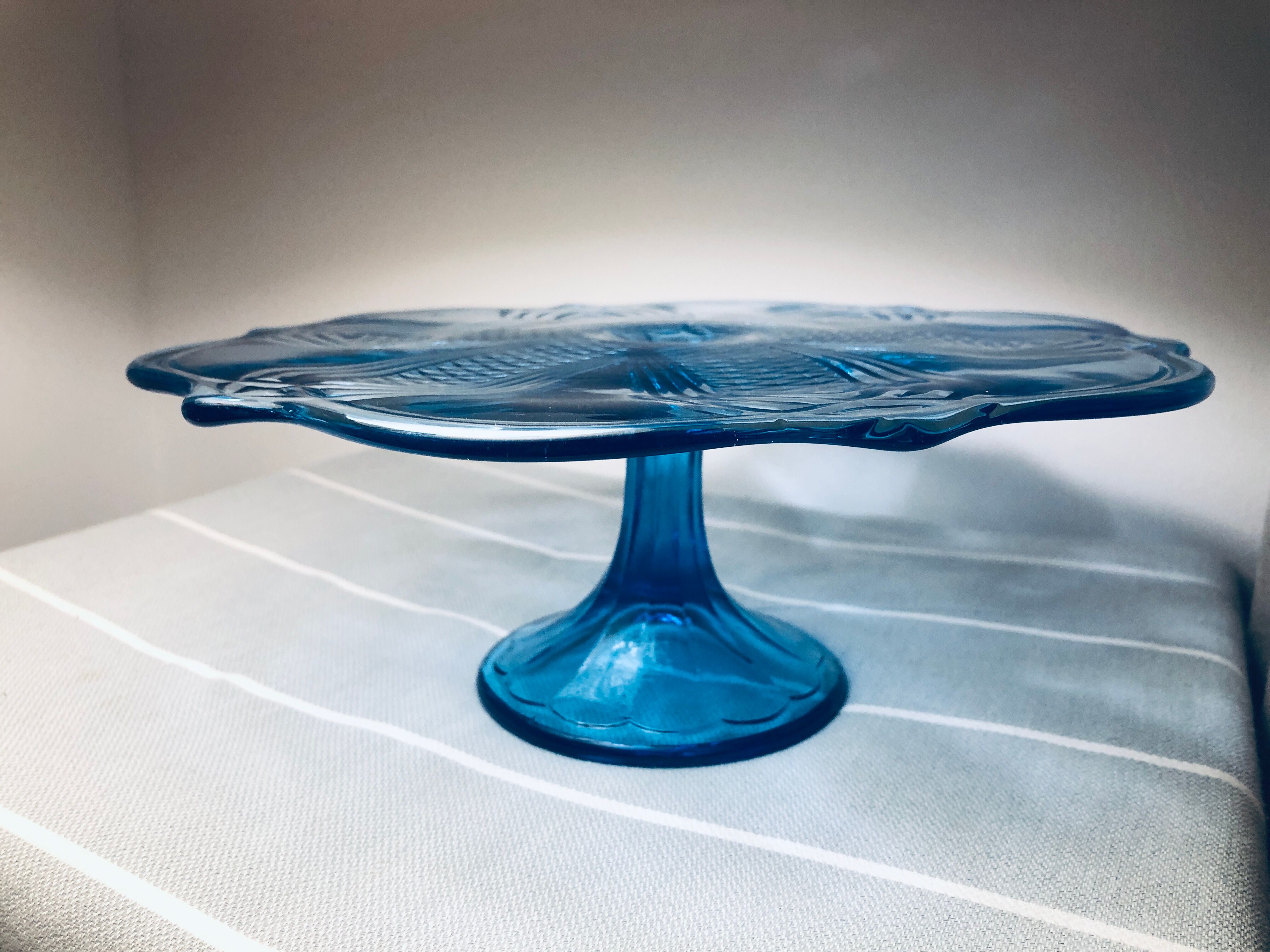Blue vintage glass cake display