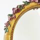 Miroir en bois doré avec fleurs