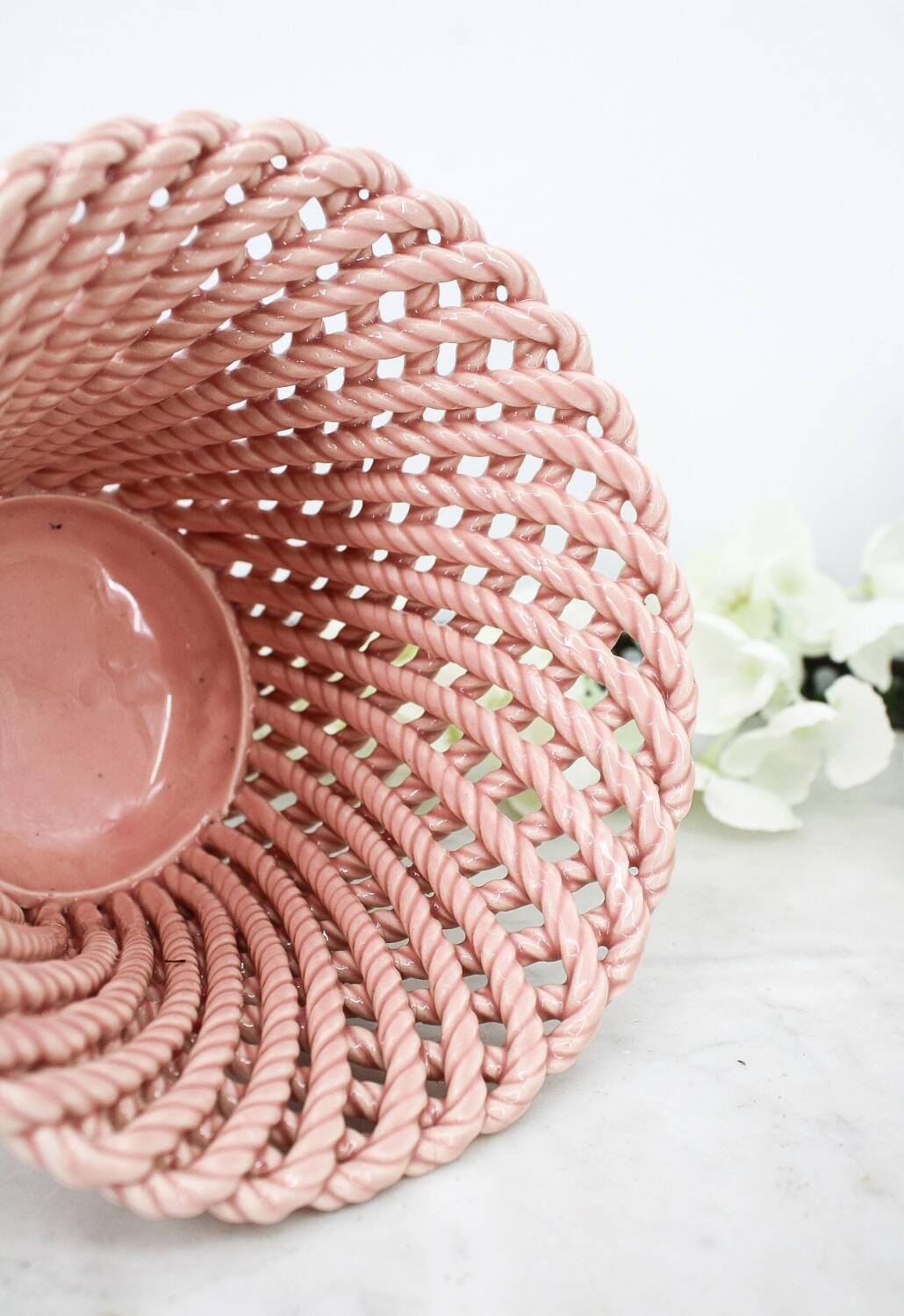 Small vintage handmade plant pot in pink woven ceramic