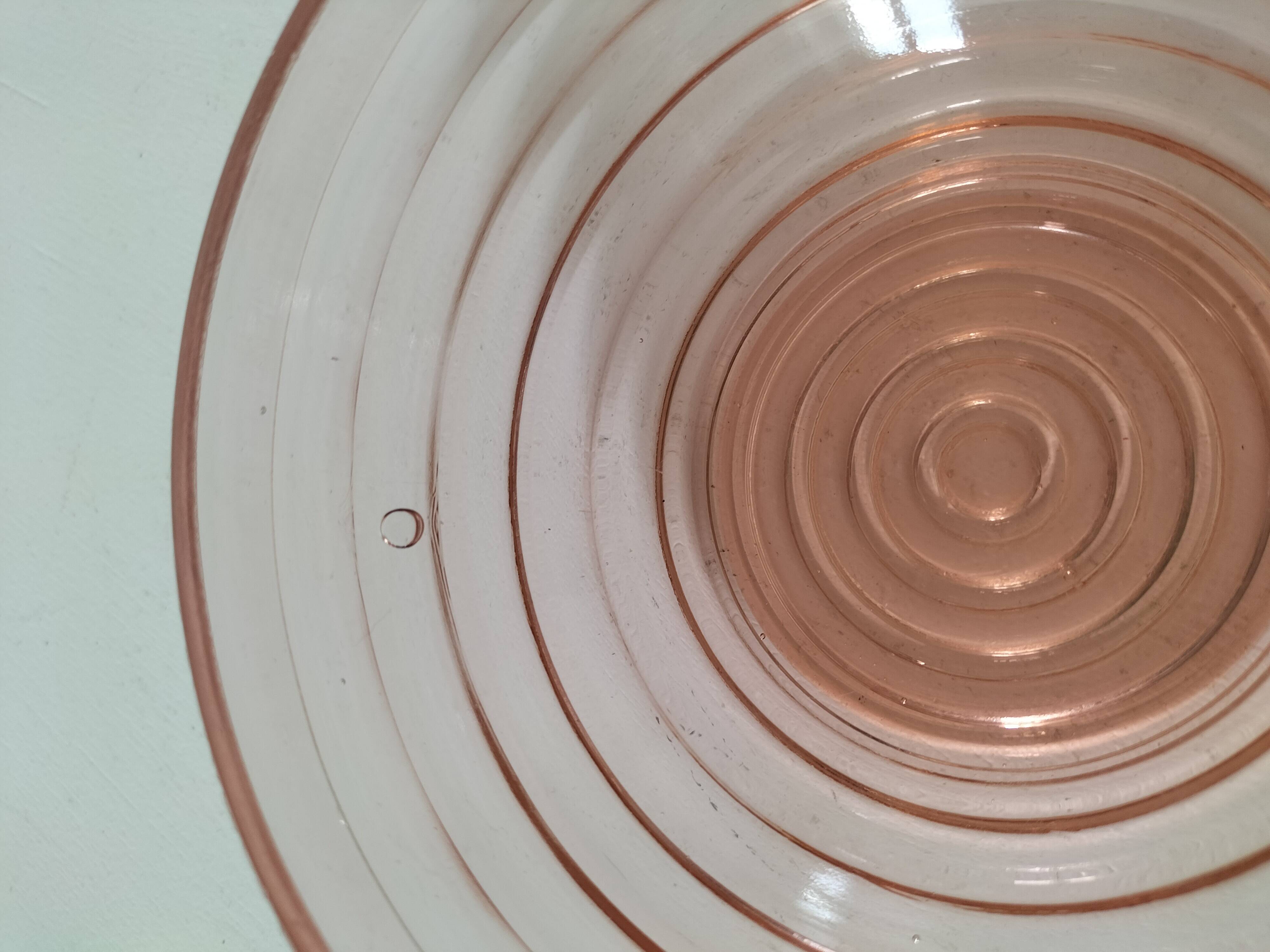 Duo of orange-pink pressed glass bowls