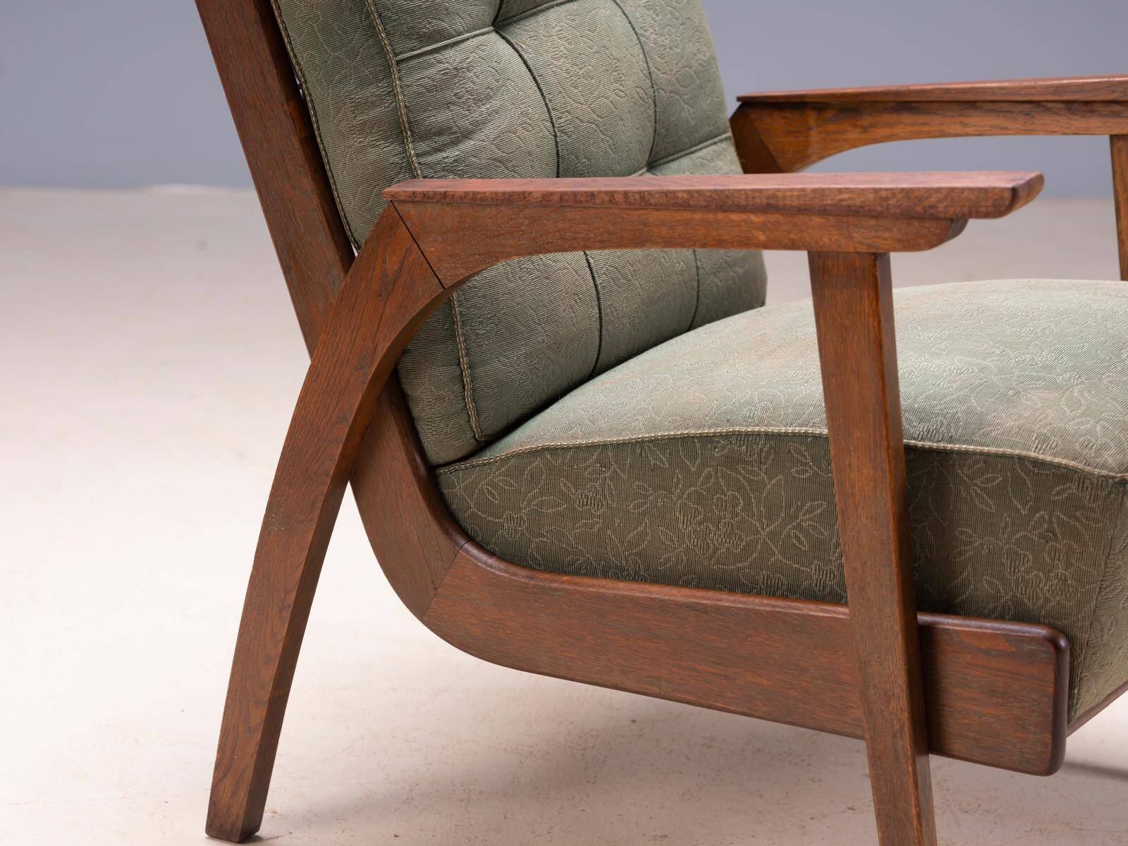 Pair of vintage mid-century lounge armchairs with wooden frames and green upholstery, 68 × 78 × 84 cm