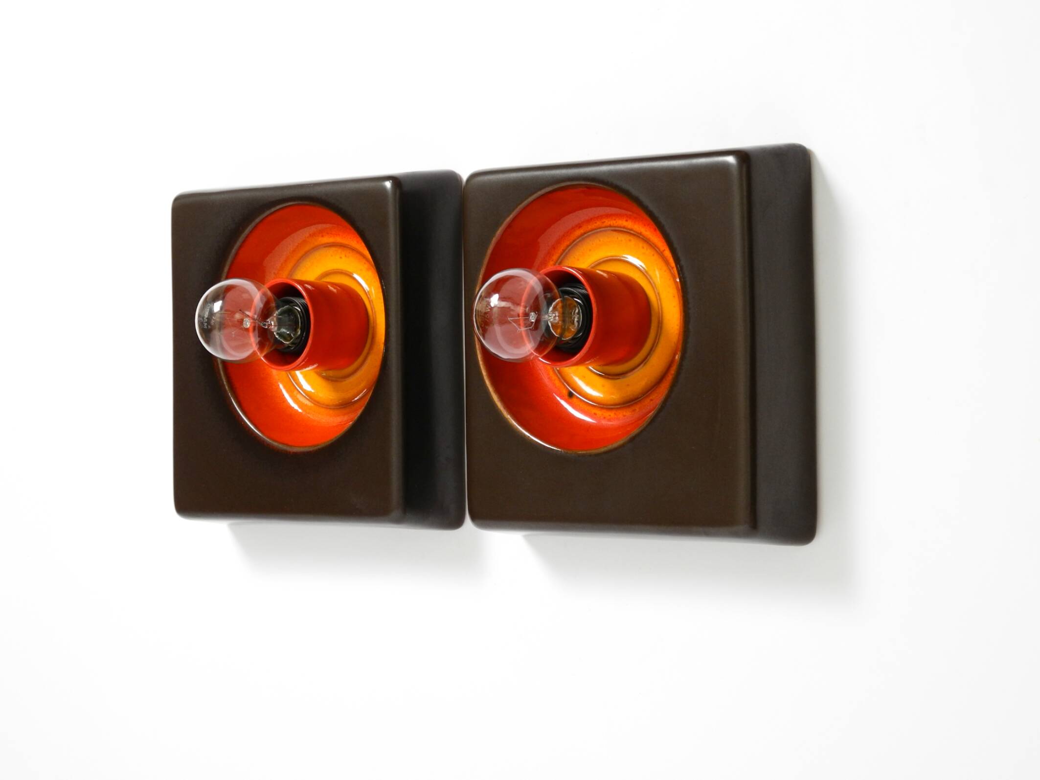 Two beautiful original 1970s Space Age ceramic wall lamps