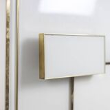 Geometric sideboard in glass and gilded brass. Contemporary Italian work.