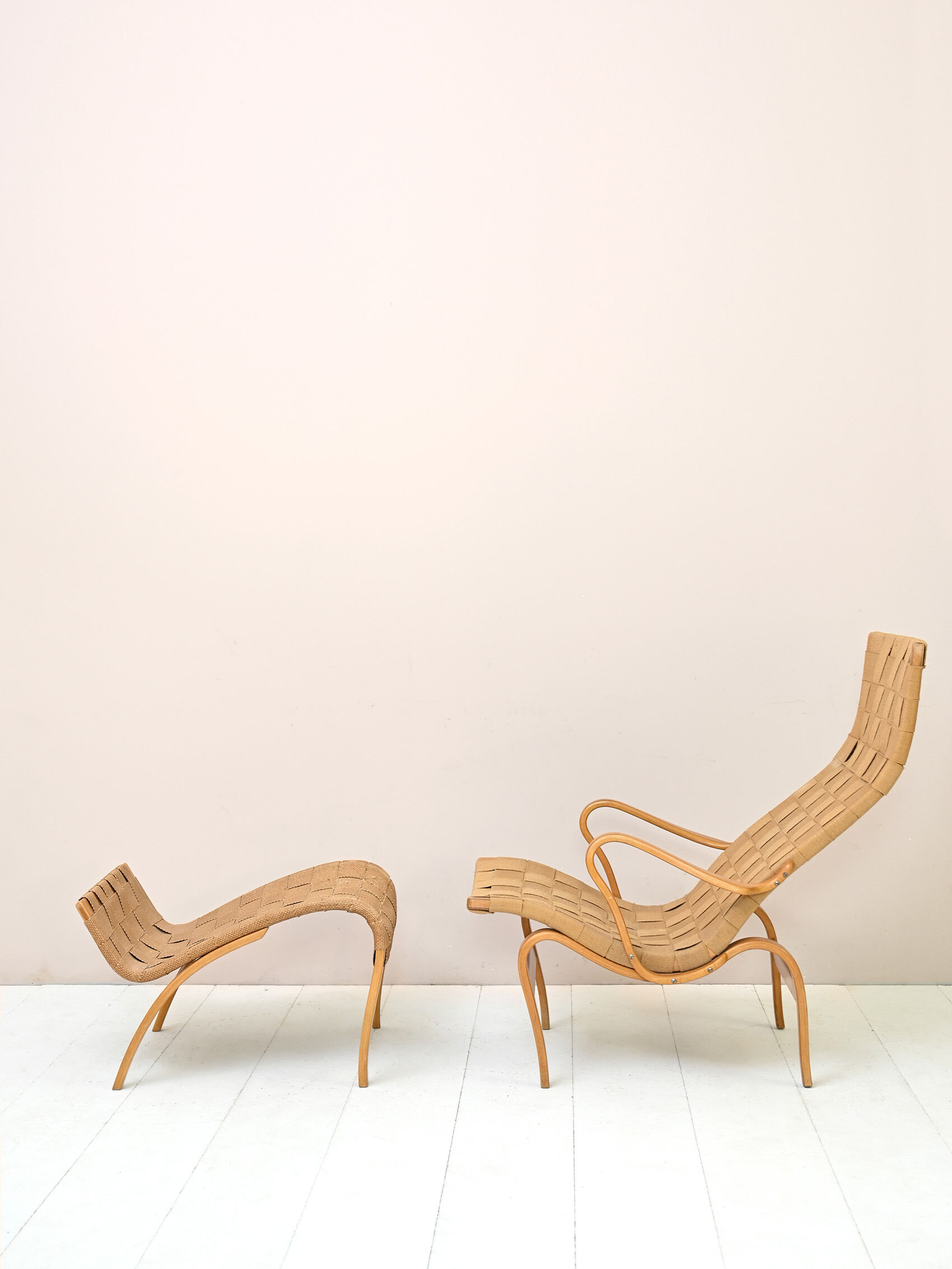'Pernilla' armchair and footstool designed by Bruno Mathsson