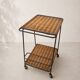 Vintage rolling dessert trolley in rattan and black metal – 1950s/60s