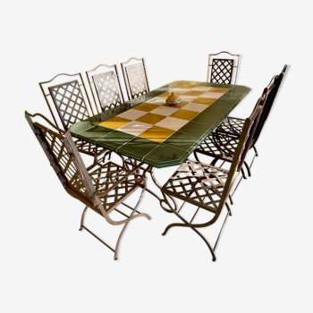 Dining table and seats for exterior or interior in metal and enameled lava tiles