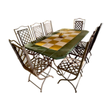 Dining table and seats for exterior or interior in metal and enameled lava tiles