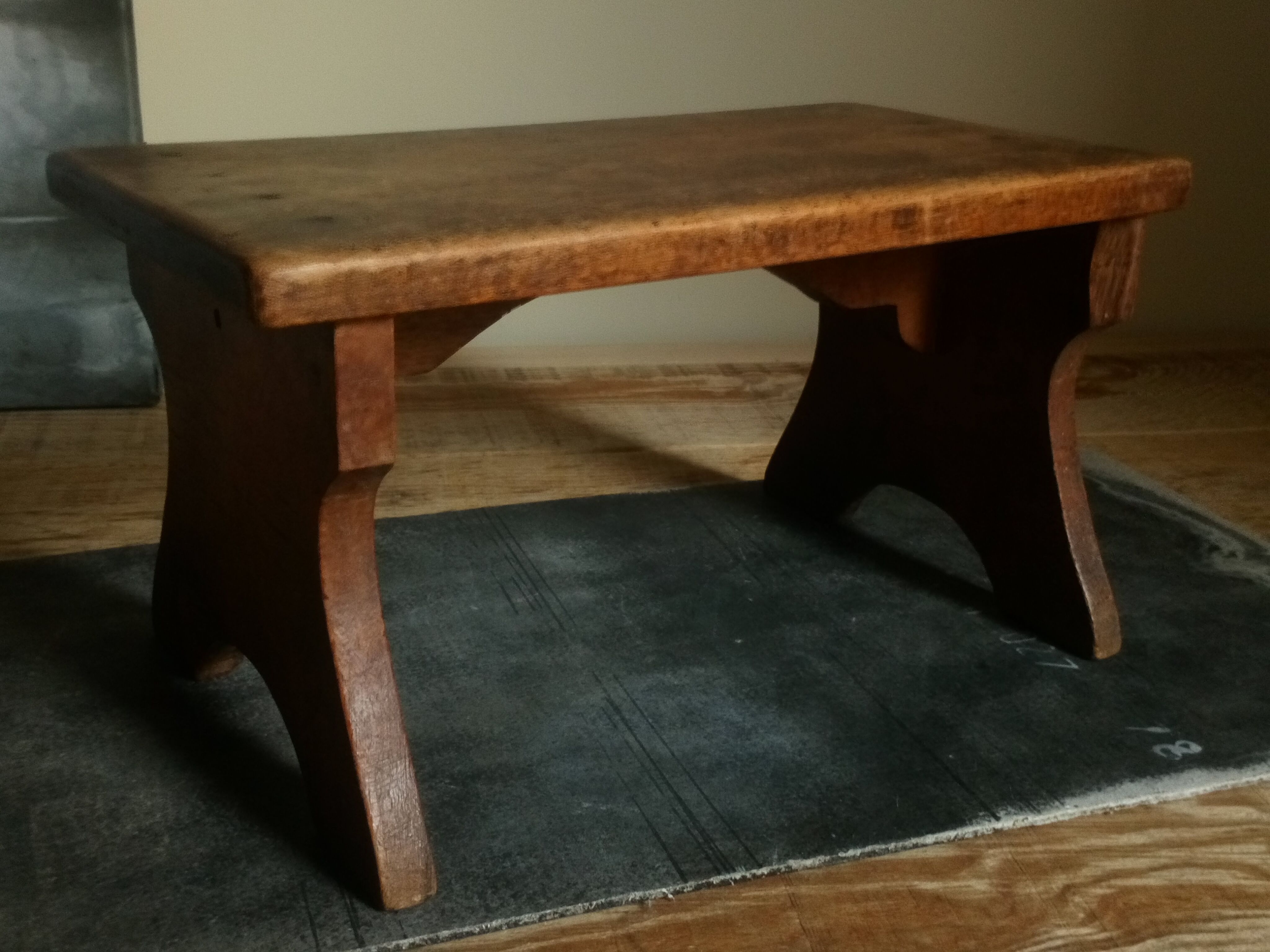 Old solid wood footring bench