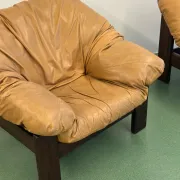 Pair of brutalist leather lounge chairs, 1960s