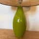 Vintage green glazed ceramic lamp and cane shade