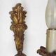 Pair of simple vintage French wall sconces in Art Nouveau bronze with leaf-shaped details.