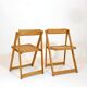 Pair of wooden folding chairs from the 80s.