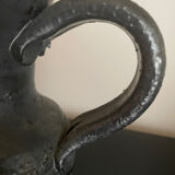 Black ceramic pitcher by Jean Marais