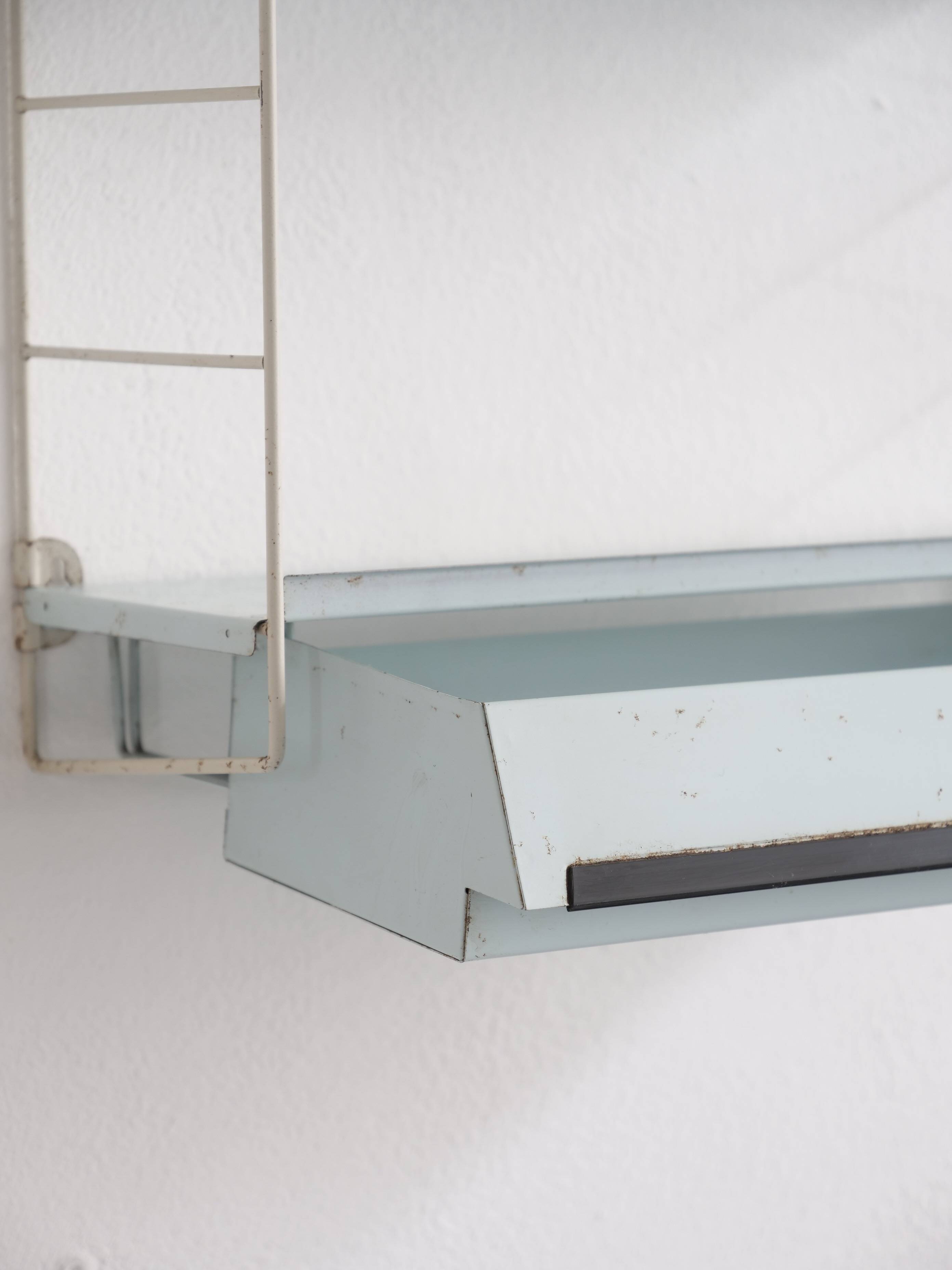 Compact tomado shelf with drawer