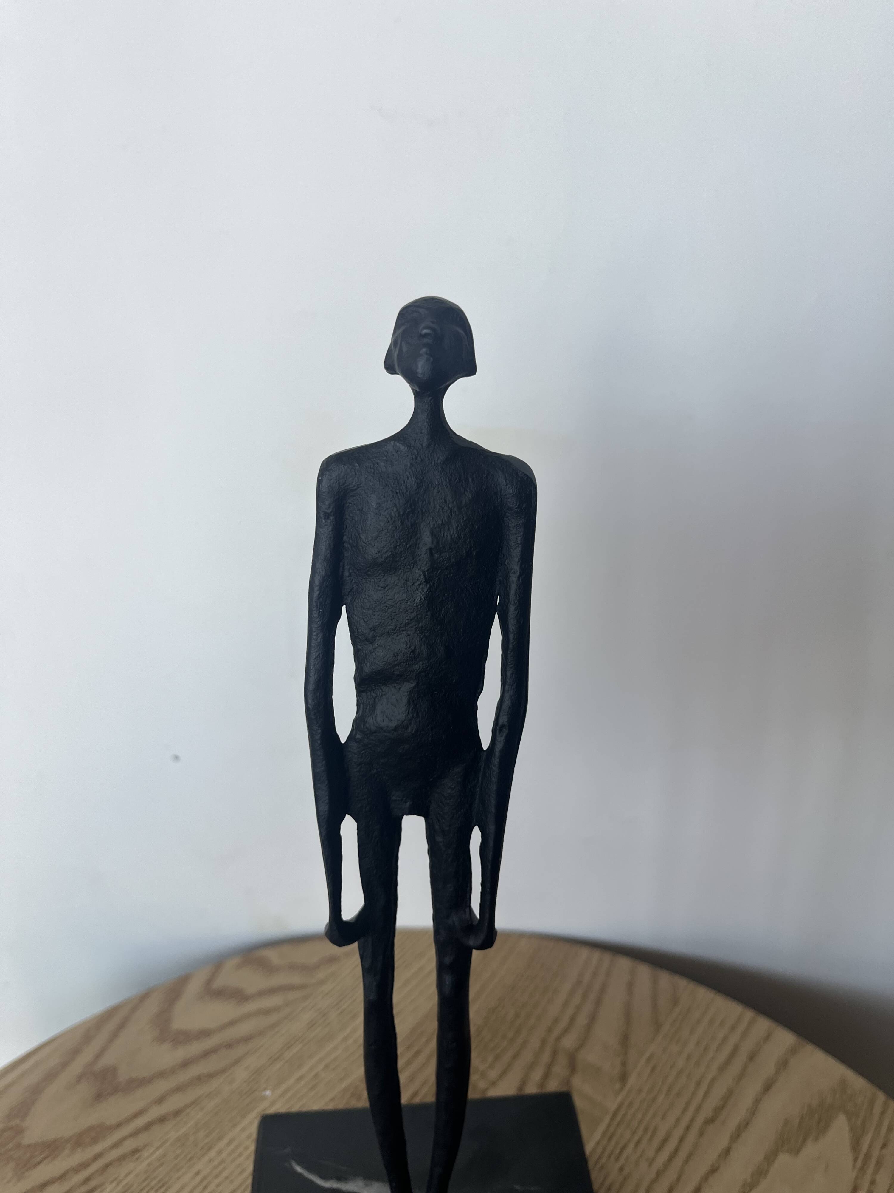 Standing Man by Giacometti