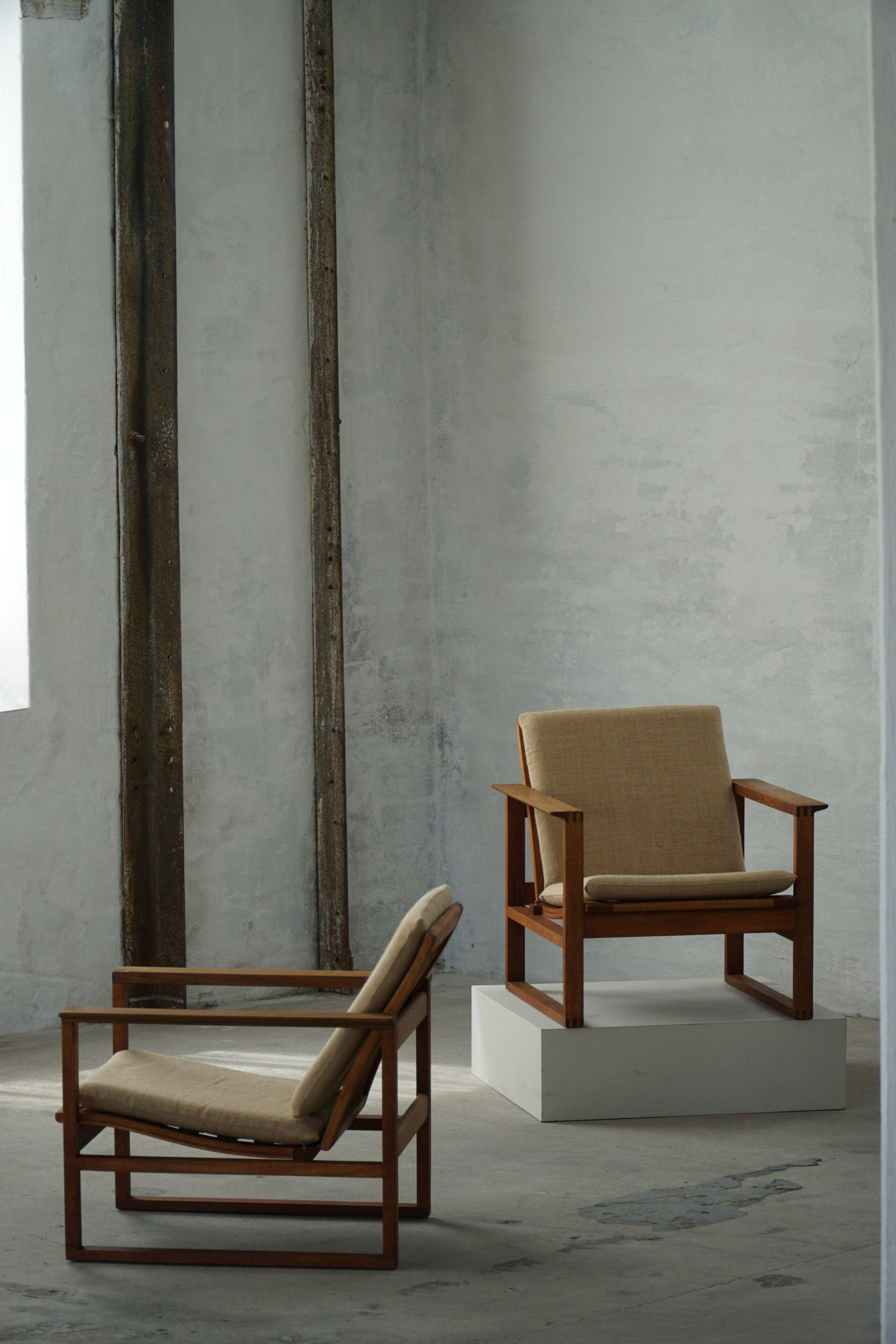 Børge Mogensen, a pair of BM2256 lounge chairs in oak and jute, Denmark, 1960s.