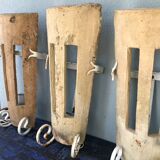 Lot of three terracotta and wrought iron appliques