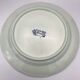 Blue enamelled earthenware wall dish with peasant scene decor Boch La Louvière