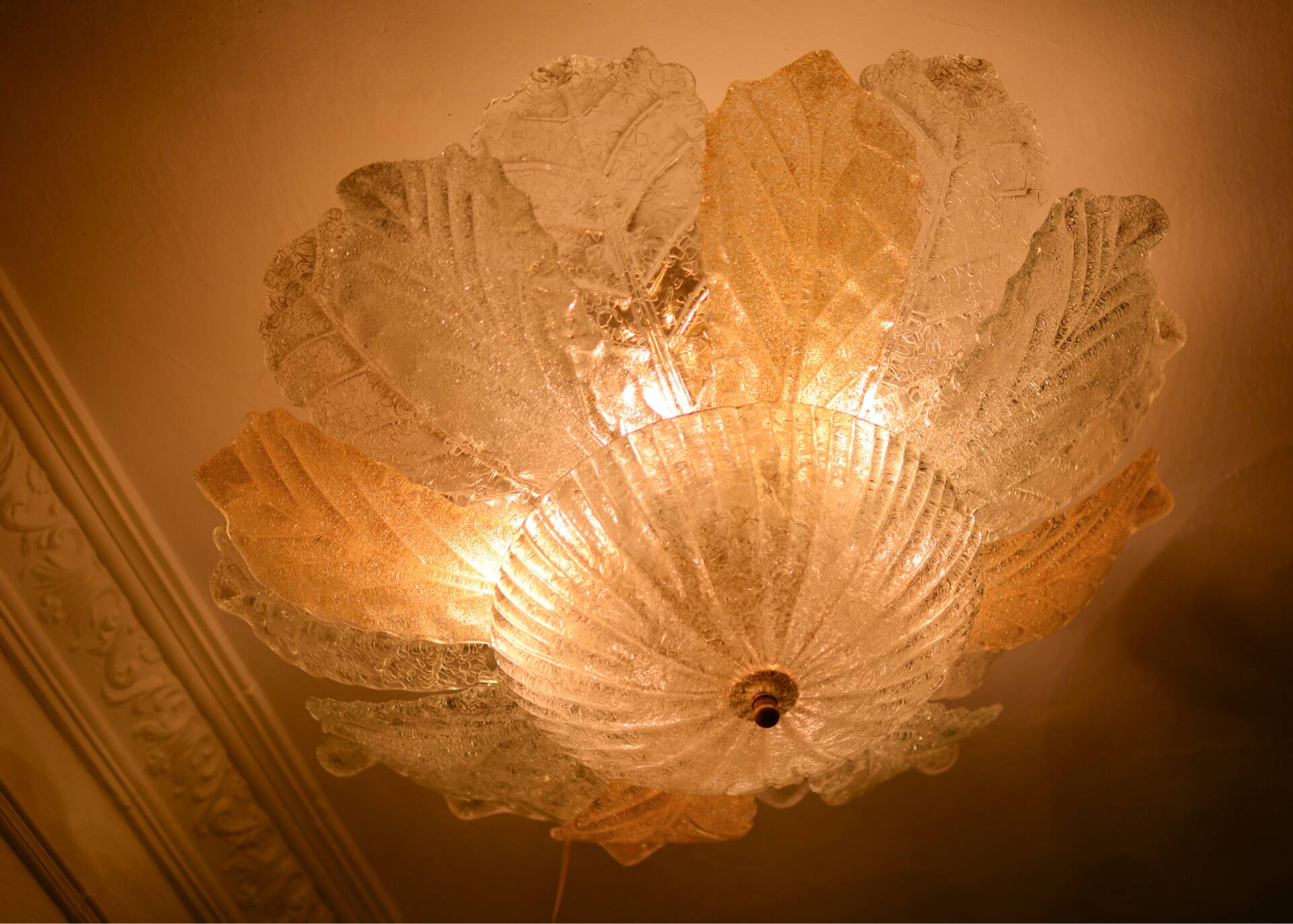 Vintage Murano chandelier/ceiling light with 16 white and amber leaves.