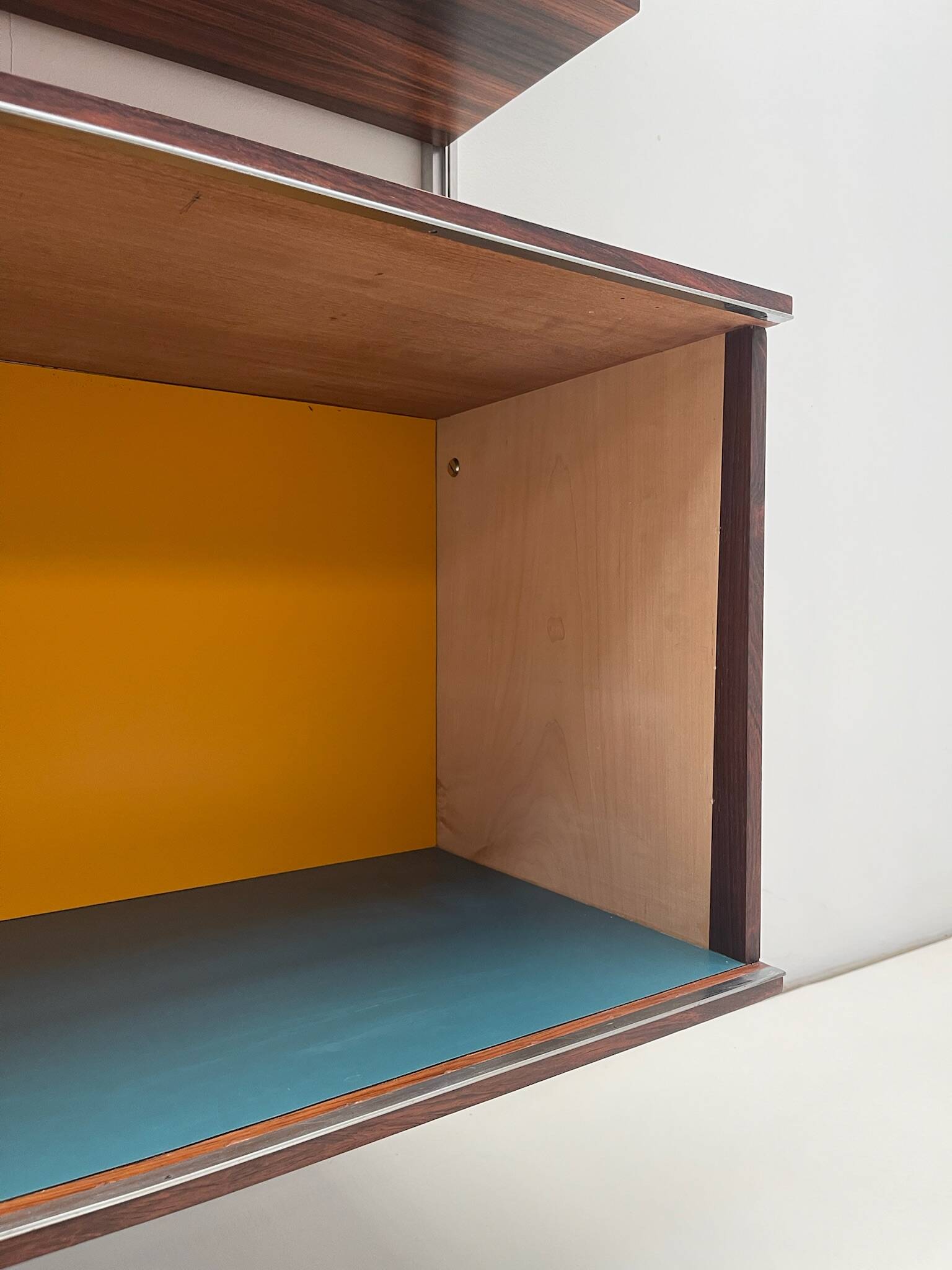 Large colorful wall unit in luxury wood