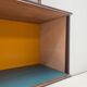 Large colorful wall unit in luxury wood