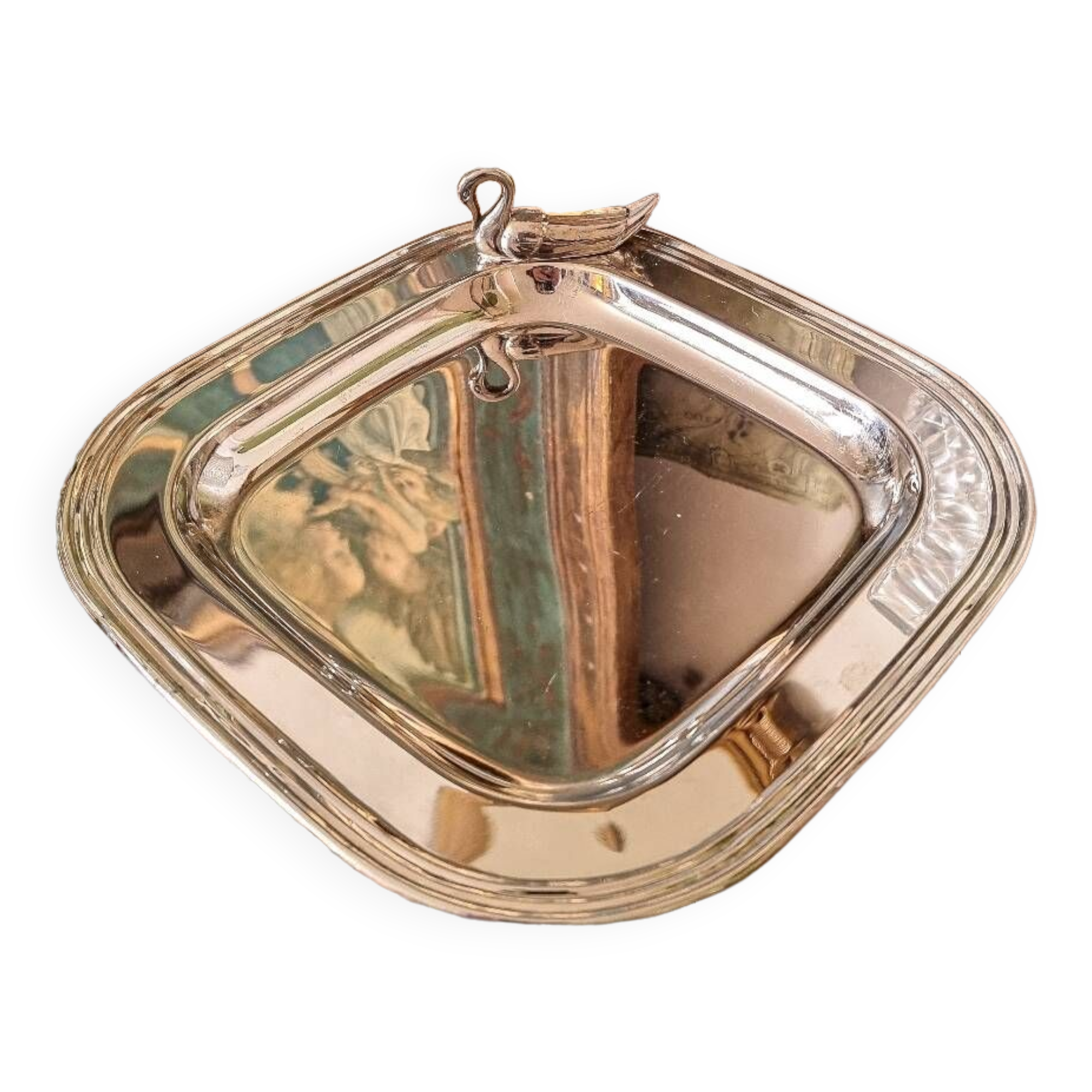 Empty pocket in silver metal, 1960, swan