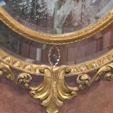 Miroir ovale en bois doré