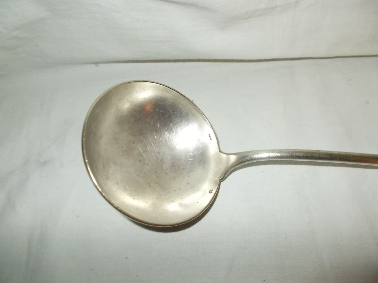 Silver metal ladle