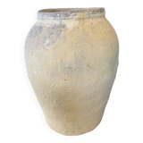 Yellow patinated cement grain jar