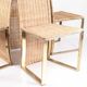 Suite de 4 chaises vintage en métal doré et osier