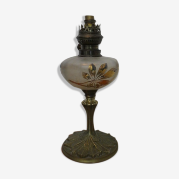 Ancient oil lamp mounted in electric lamp