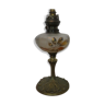 Ancient oil lamp mounted in electric lamp