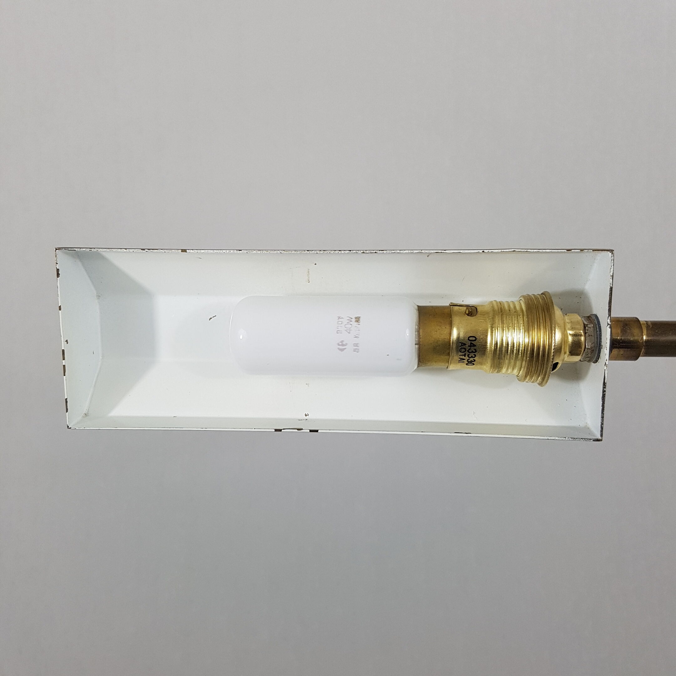 Articulated brass floor lamp