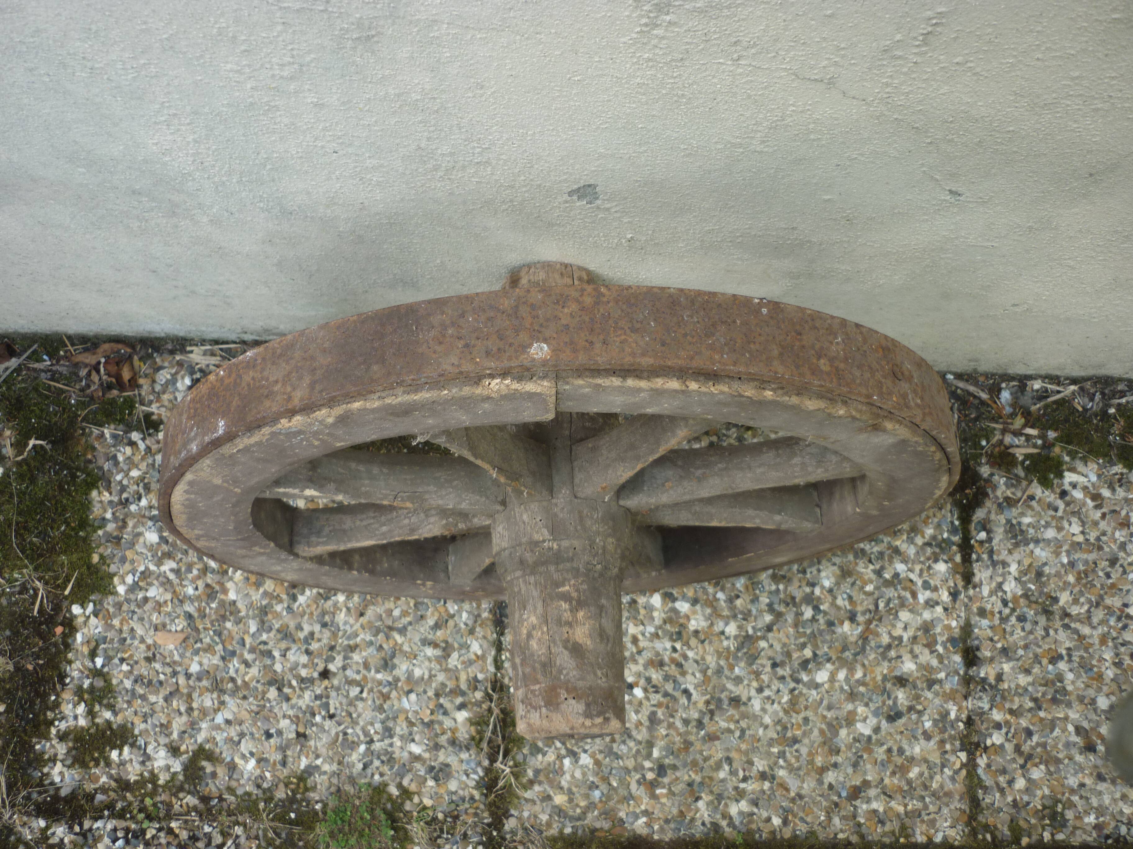 Old wooden cart wheel