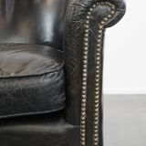 Black grained cowhide leather armchair