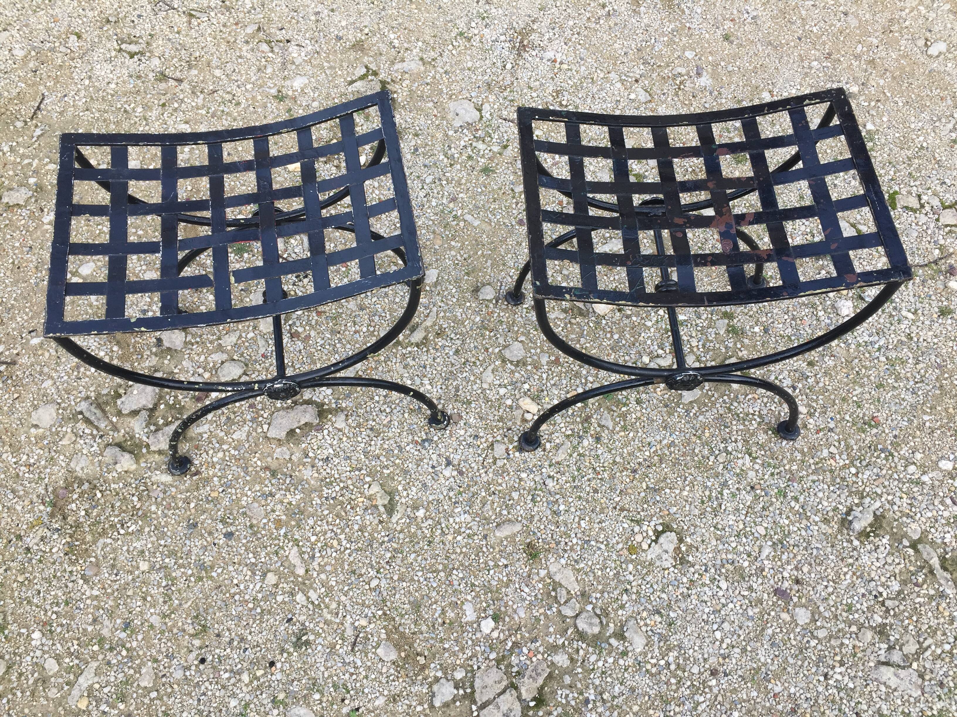 Pair of metal curule splashes
