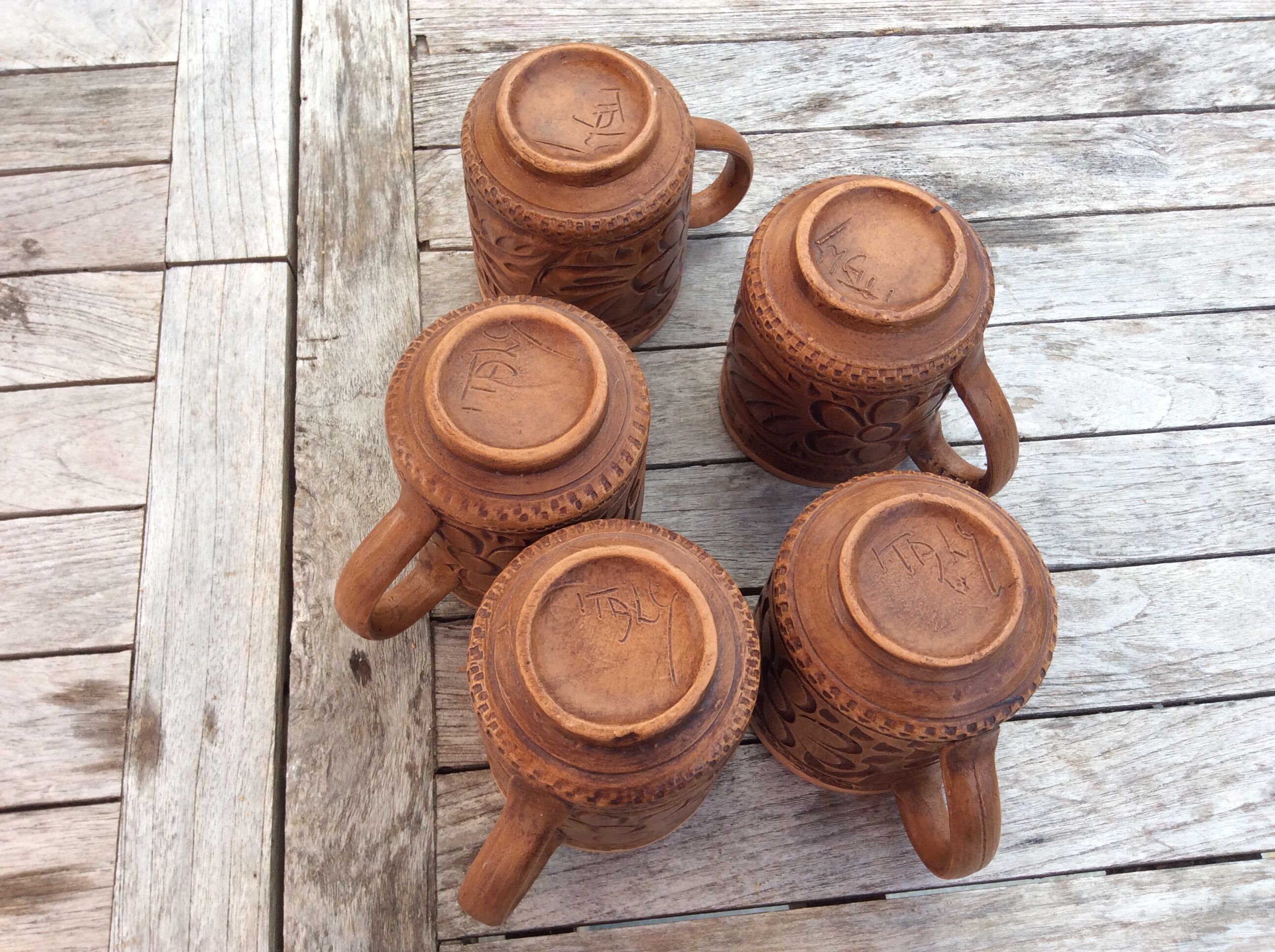 5 terracotta mugs