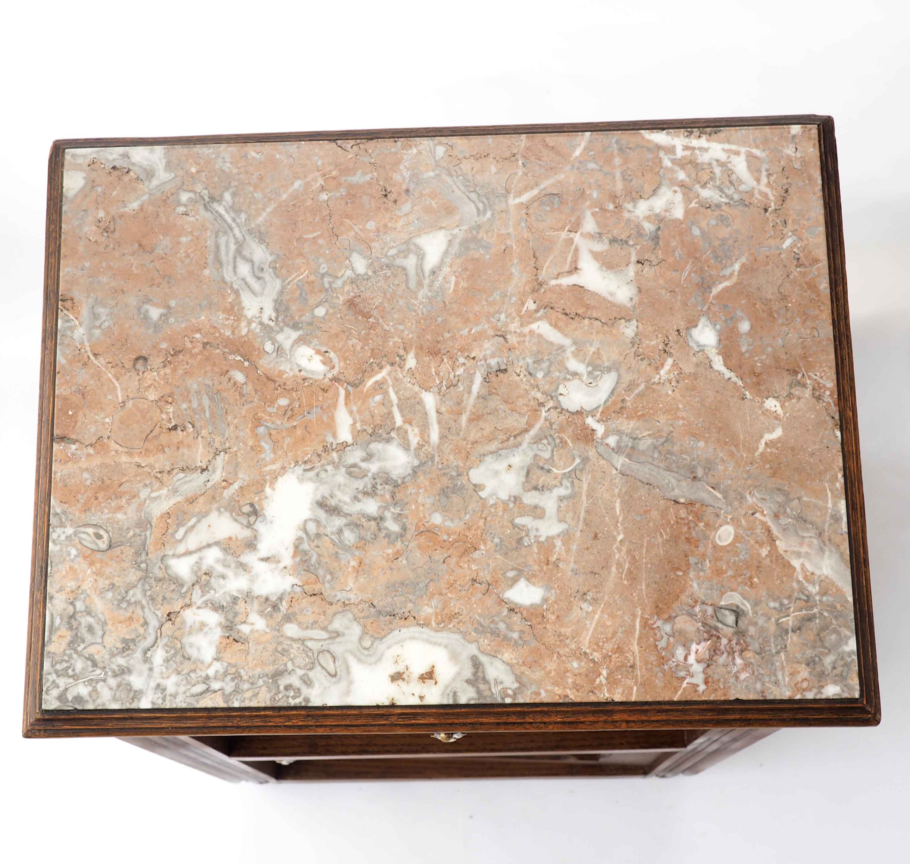 Old pink marble bedside