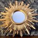 Miroir soleil bois feuille d’or 50 cm