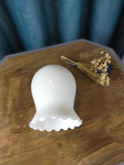 White opaline shaped like a lily of the valley bell
