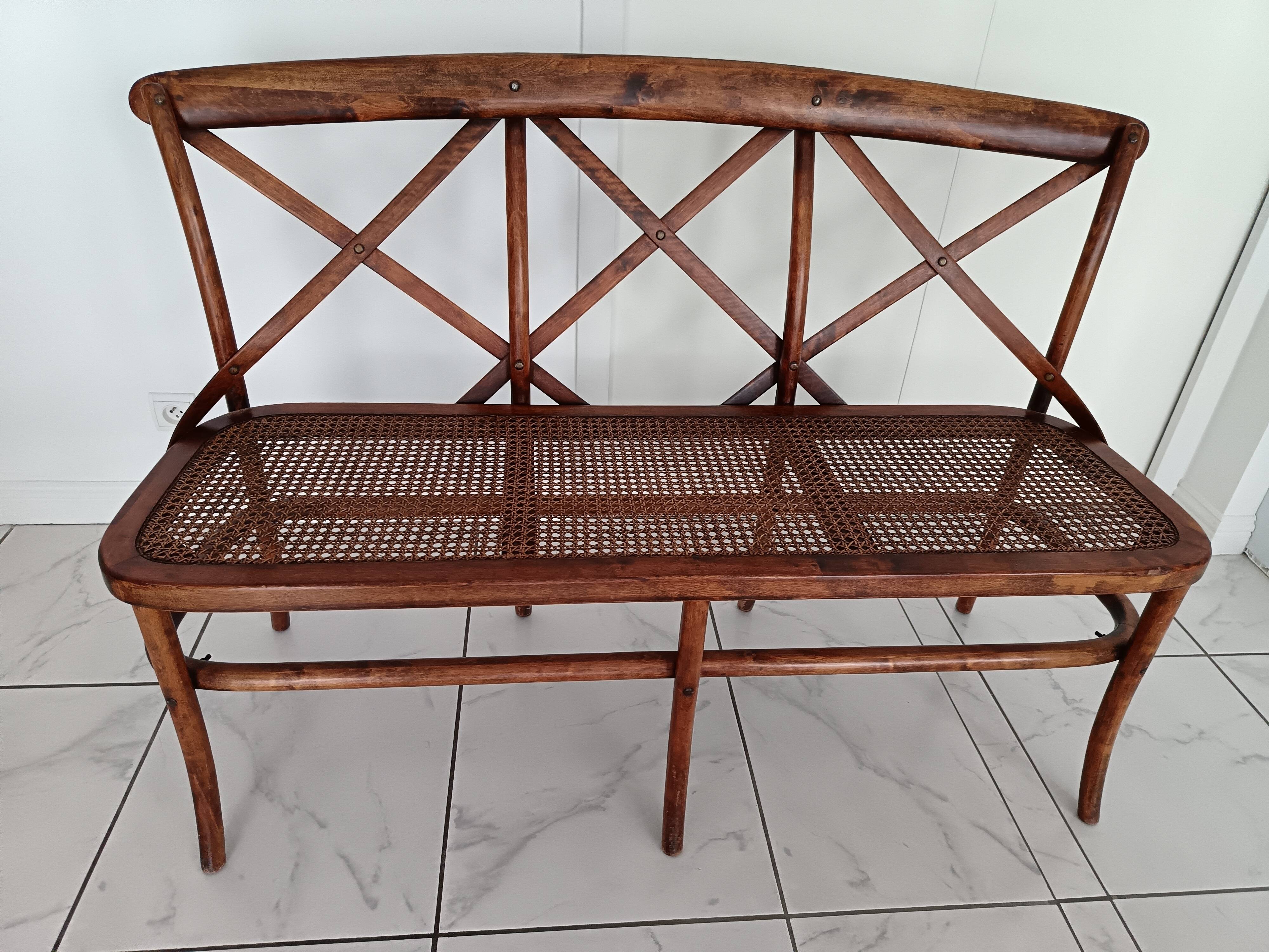 CURVED WOOD AND CANE BENCH