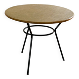 Tripod coffee table with a straw covering.