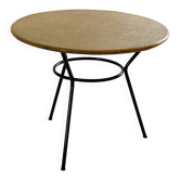 Tripod coffee table with a straw covering.