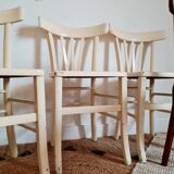 4 mismatched antique bistro chairs