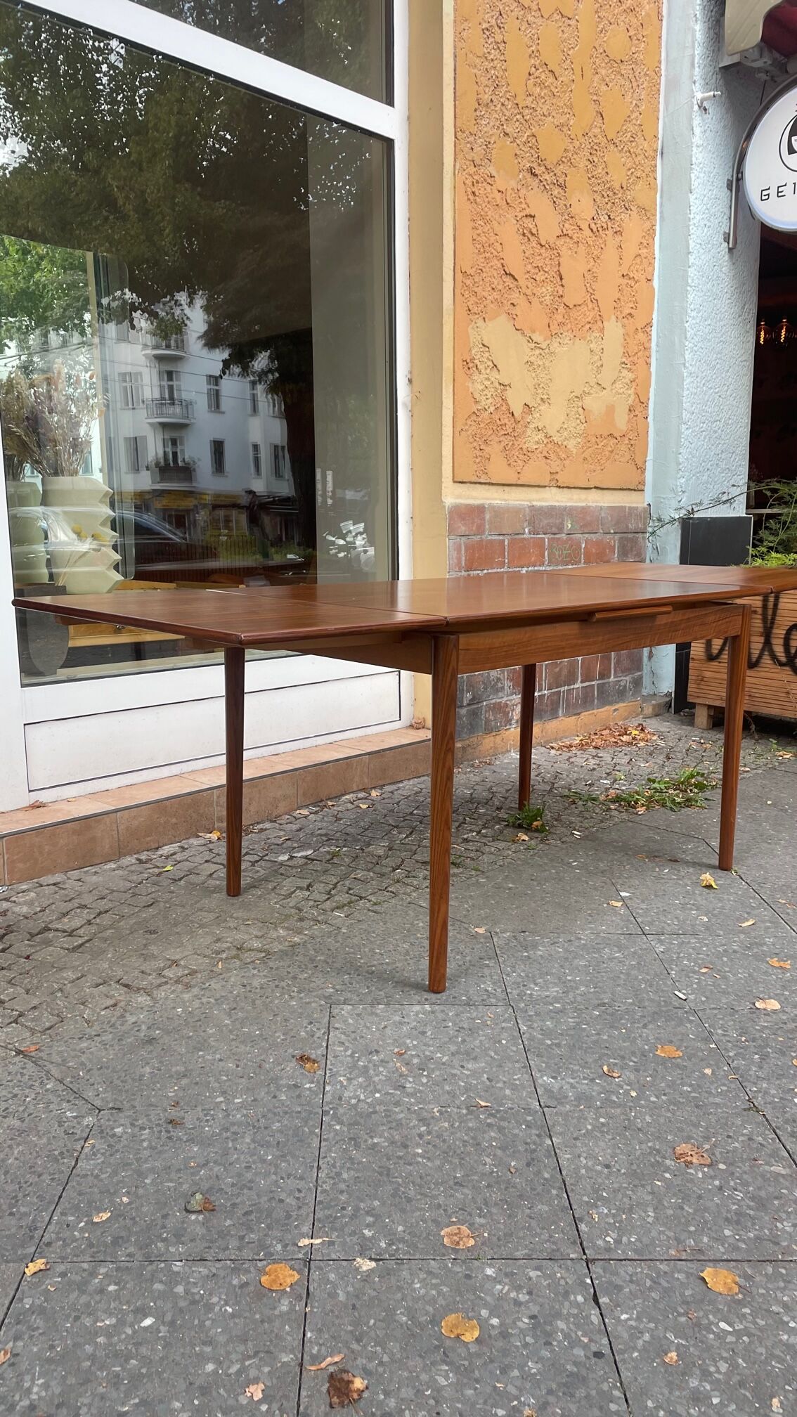Vintage dining table from the 60s in extendable teak