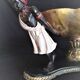 Centerpiece with African characters, plaster, resin and wood