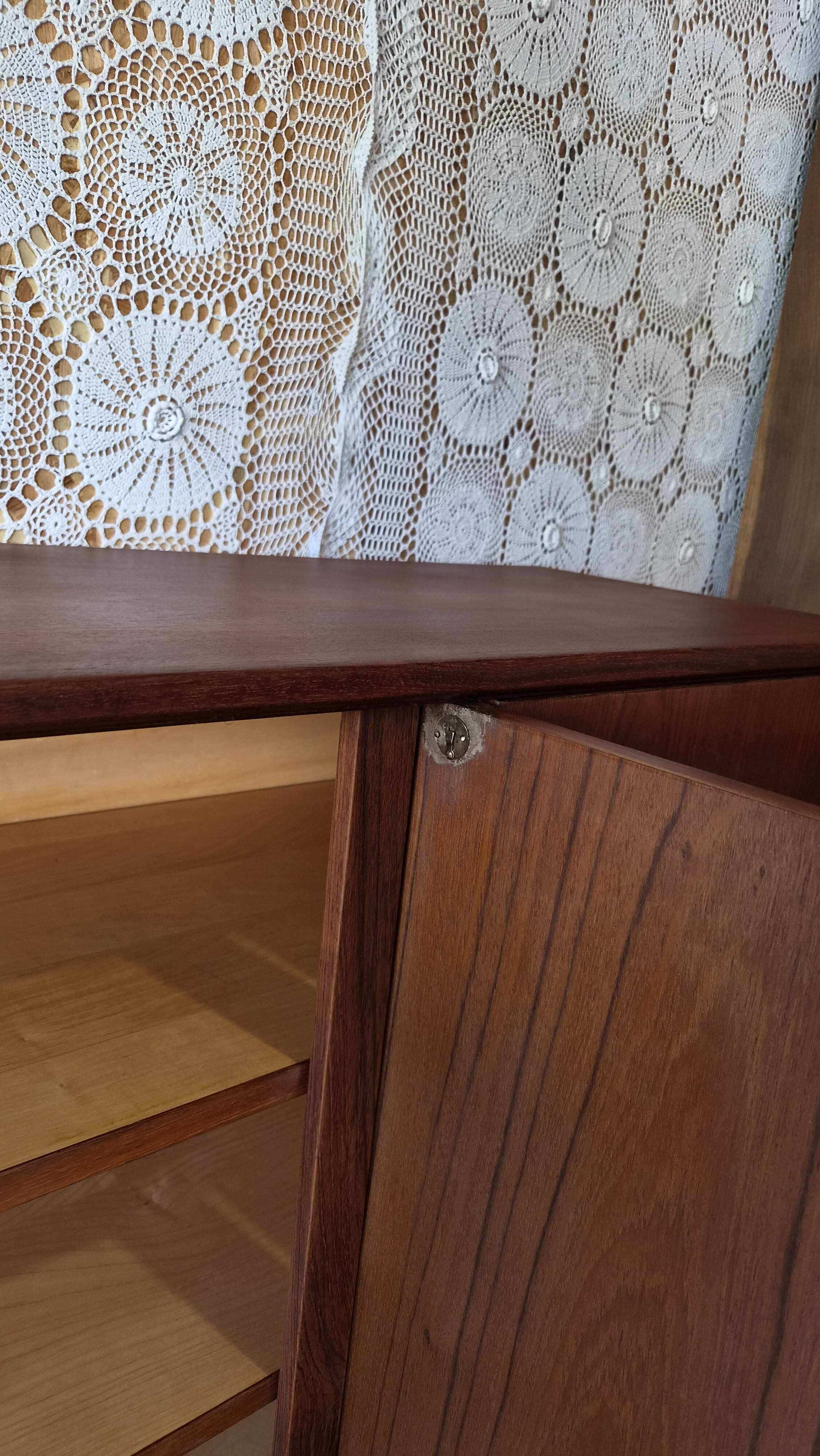 Scandinavian threading Swiss teak model 6002 dated 1961.