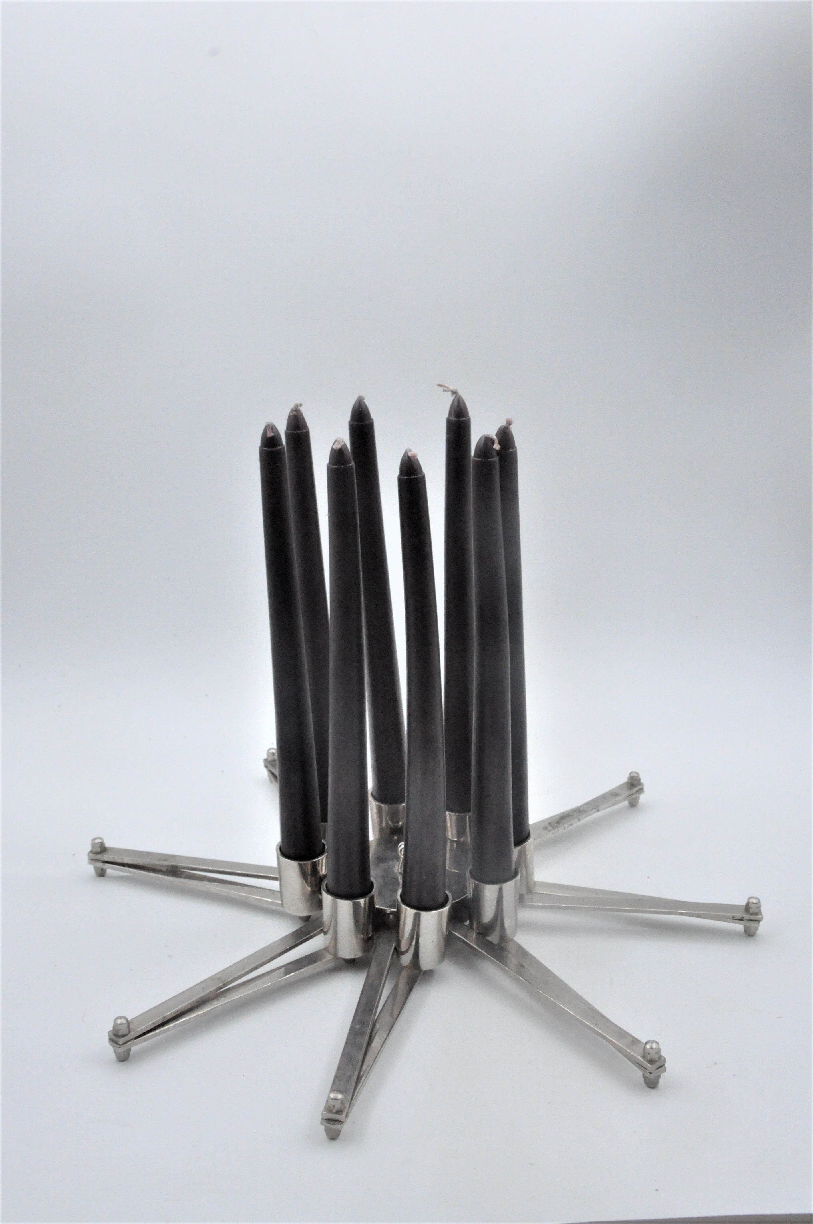 Design candle holder in silver metal, with 8 candles, modular spider