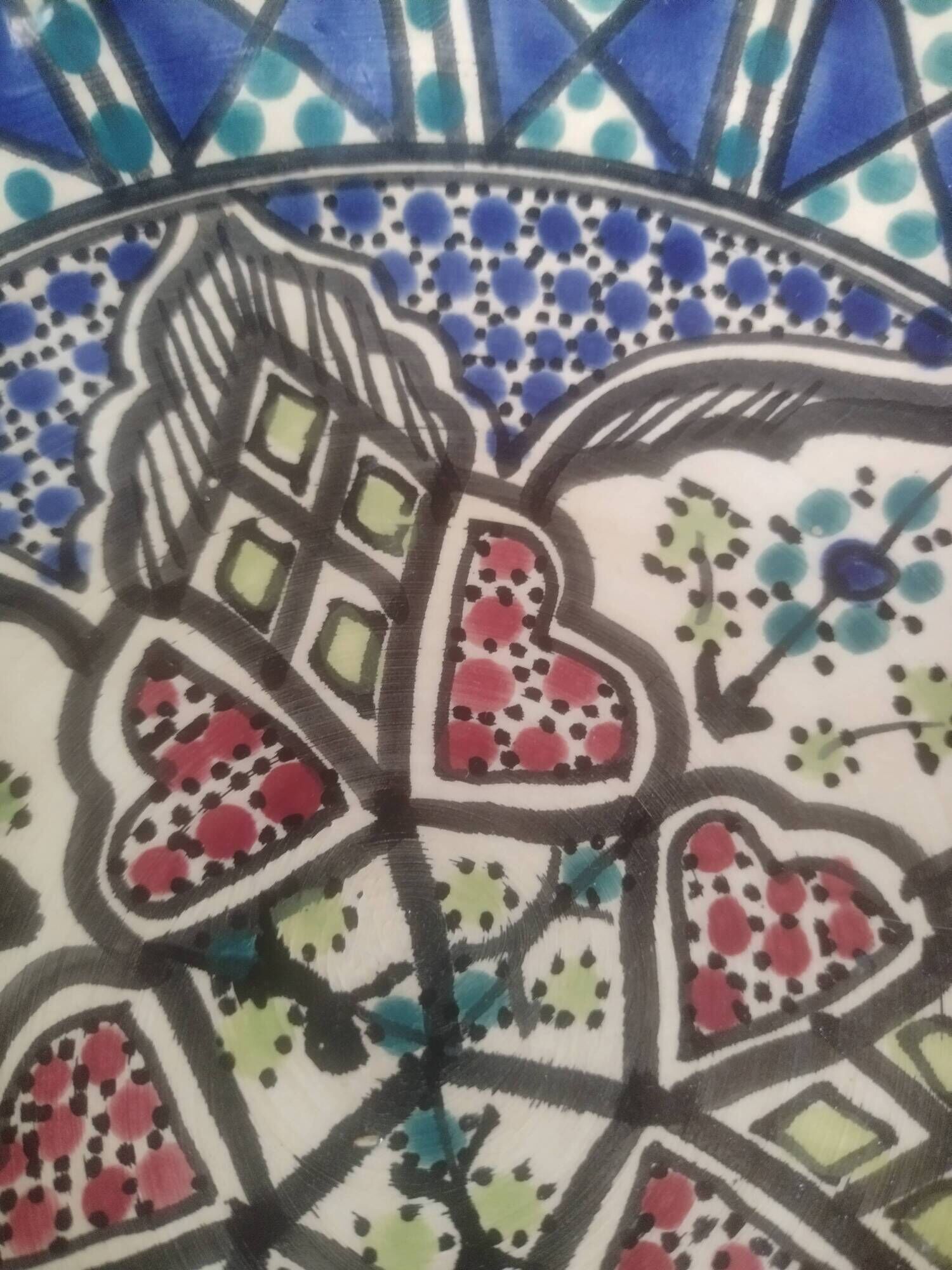 Antique Tunisian ceramic plate, signed and numbered.