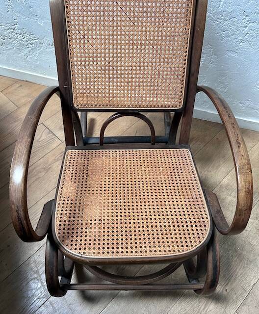 Curved wooden rocking chair